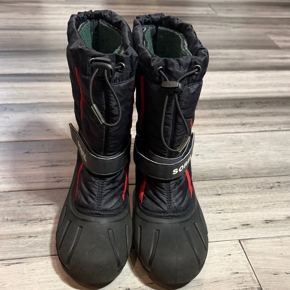 Sorel Men  Black Winter Boots with Red Accents